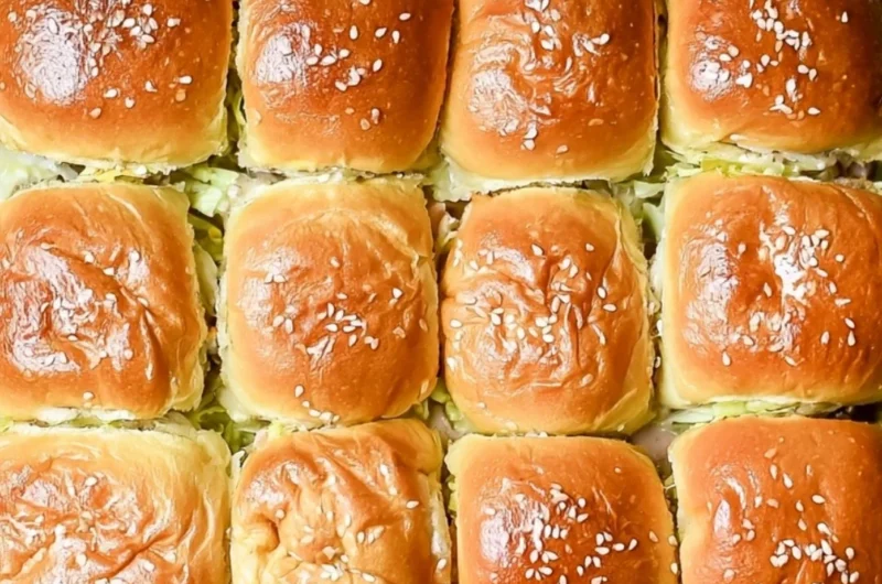 Big Mac sliders served on a plate with toppings and condiments