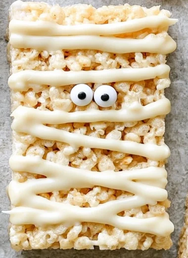 Spooky Mummy Rice Krispie Treats decorated for Halloween